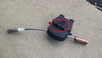 Ear defender hole for chin strap.jpg